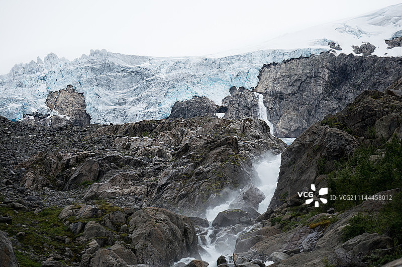 蓝色的冰冰川前缘。布尔冰川,挪威。图片素材