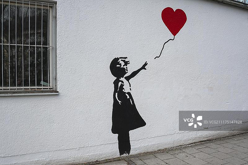 墙上有涂鸦，孩子心形气球，来自艺术家班克斯的复制品，慕尼黑，巴伐利亚，德国，欧洲图片素材