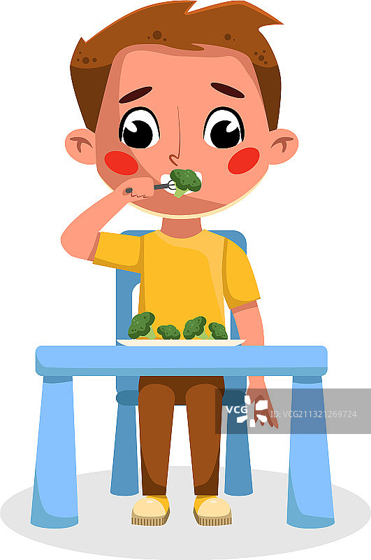 可爱的男孩吃健康的食物好孩子的行为图片素材