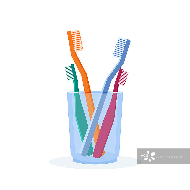牙刷和杯属粉、蓝、绿、橙图片素材