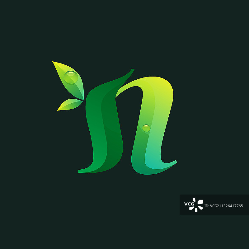 字母生态标志带有绿叶和露水。图片素材