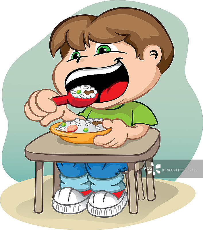 孩子坐在餐桌前喂食图片素材