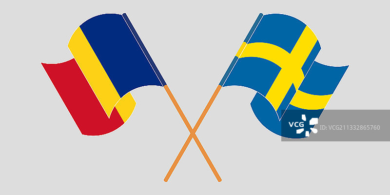 交叉挥舞着罗马尼亚和瑞典的旗帜图片素材