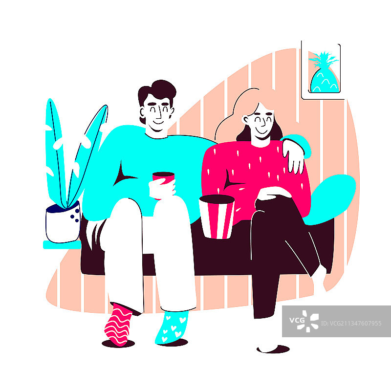 一对夫妇看电视，男人和女人坐在沙发上图片素材