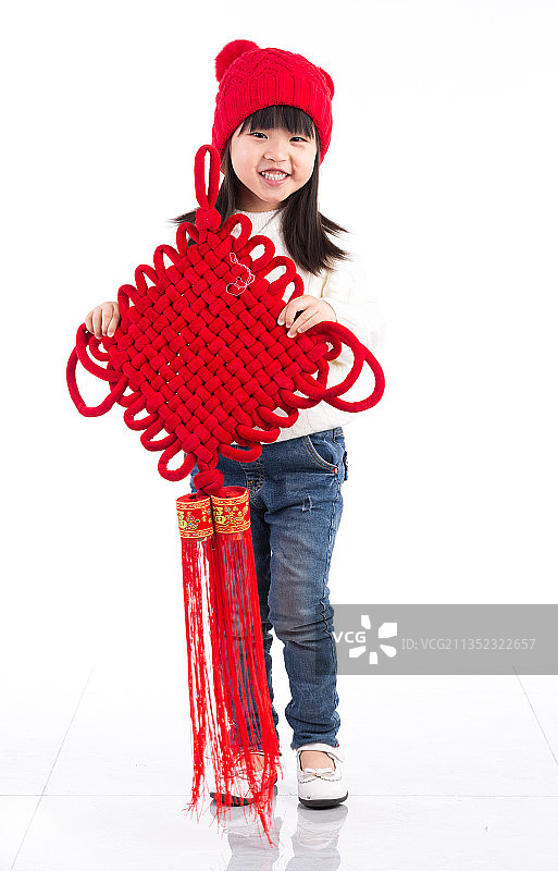 拿中国结的小女孩图片素材
