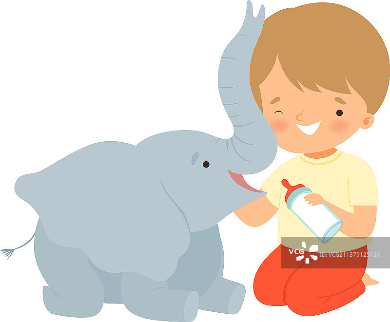 可爱的小男孩正在给小象喂奶图片素材