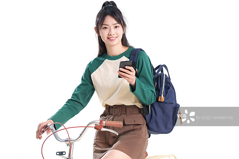 骑自行车的女大学生图片素材
