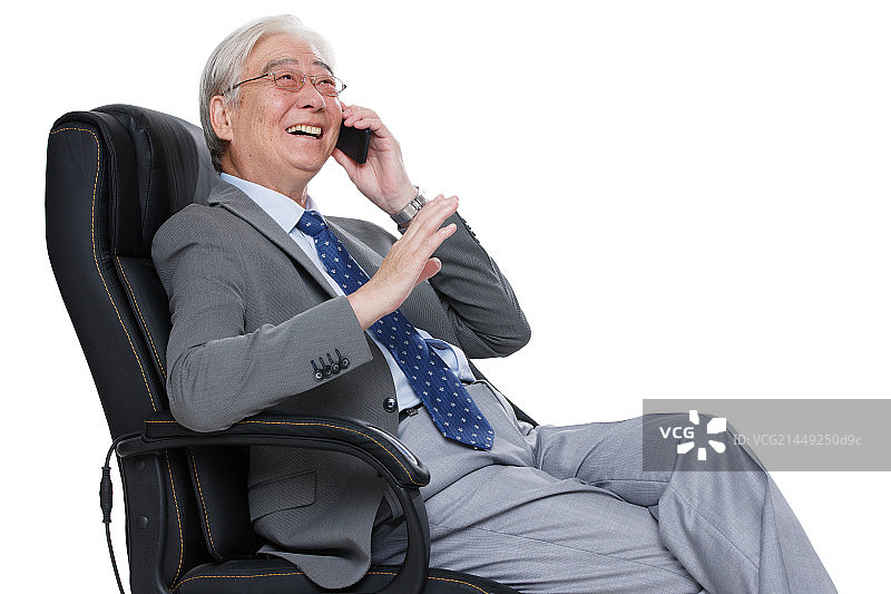 一个商务老年男人在打电话图片素材