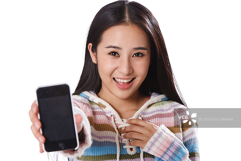 青春活力的年轻女孩拿着手机图片素材