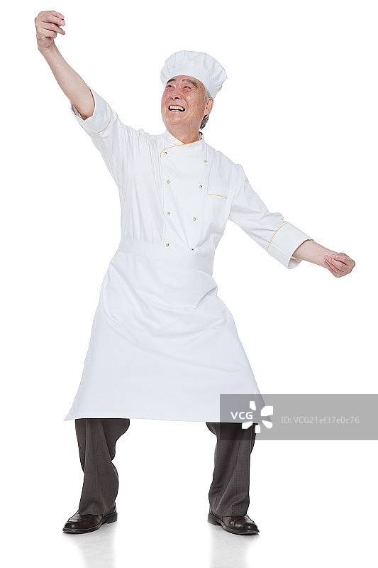 穿着厨师服的老年男人做手势图片素材