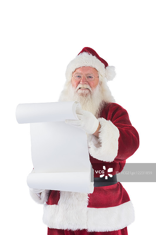 圣诞老人拿着一张白色背景的清单图片素材