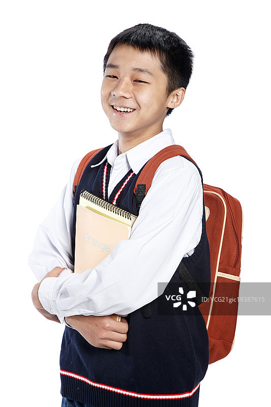 一个中学男生背着书包图片素材