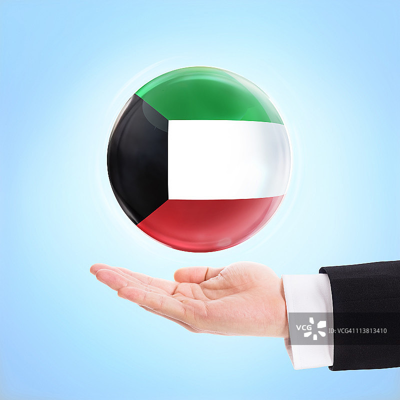 用手撑着科威特国旗图片素材
