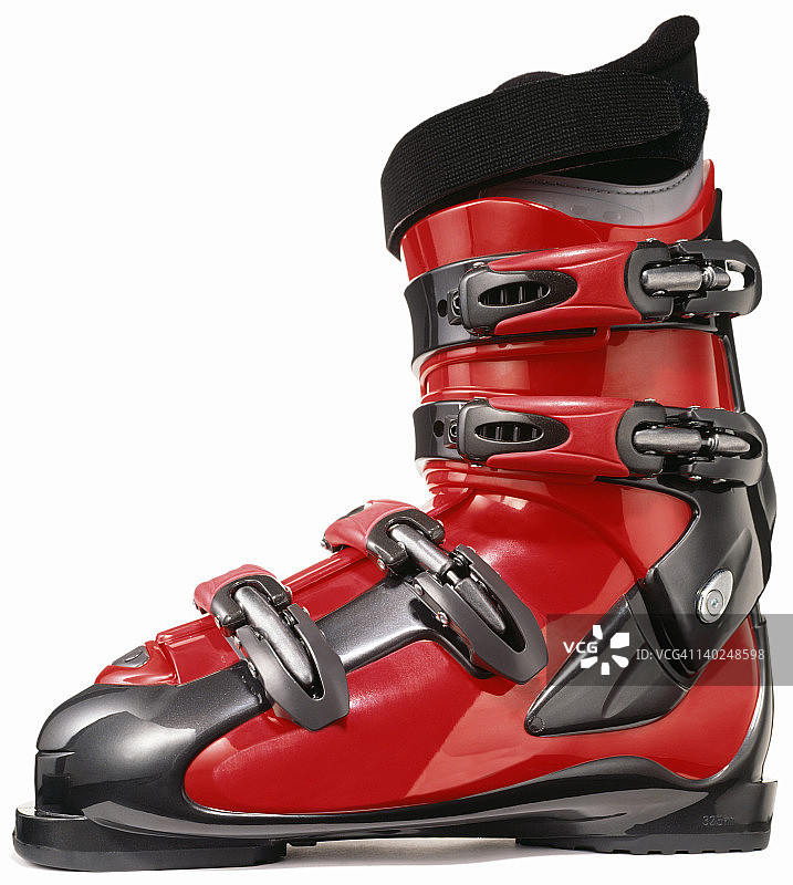 一个现代红色滑雪靴的侧面图片素材