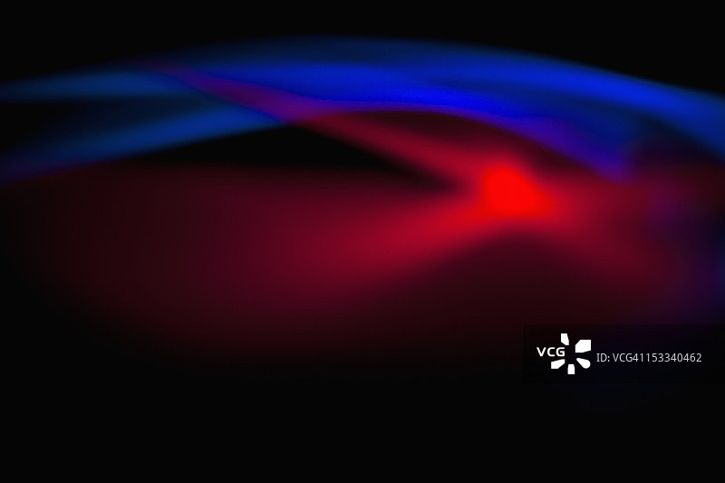 蓝色和红色光在黑色背景上的抽象图案图片素材