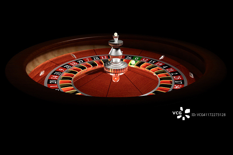 黑暗的赌场里的轮盘赌图片素材