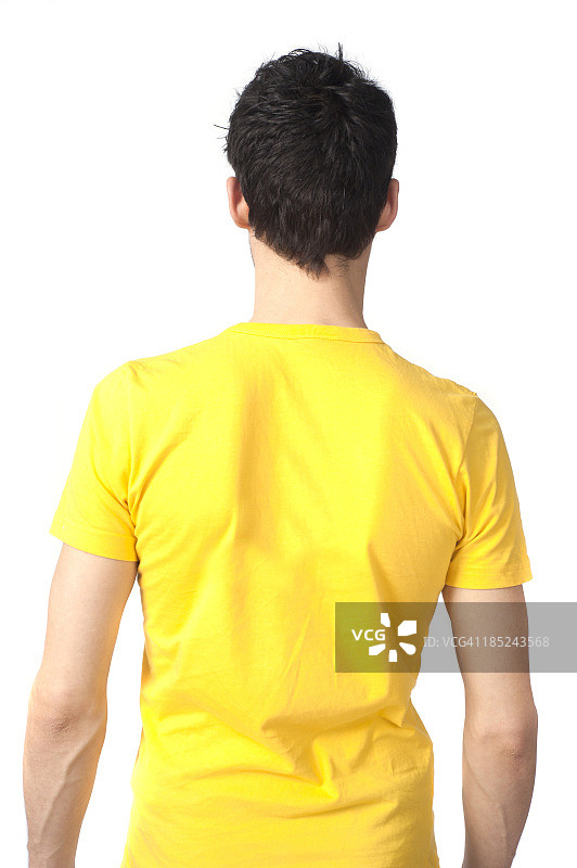 一个穿着黄色衬衫的男人的背部躯干图片素材