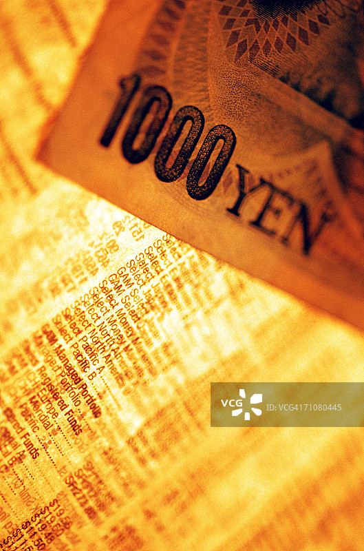 日元:1000日元纸币和股市数据，特写图片素材
