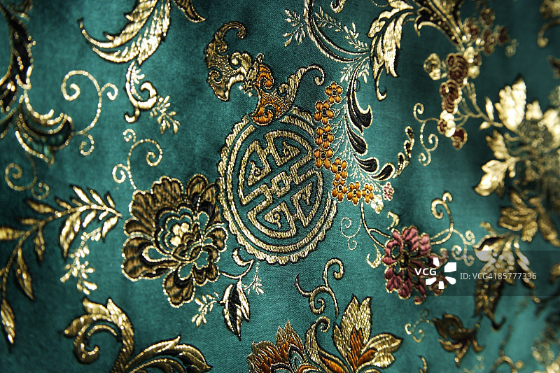细节翡翠绿色中国丝绸织物图片素材
