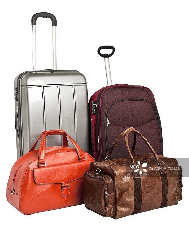 两个手提箱和两个皮制旅行袋图片素材