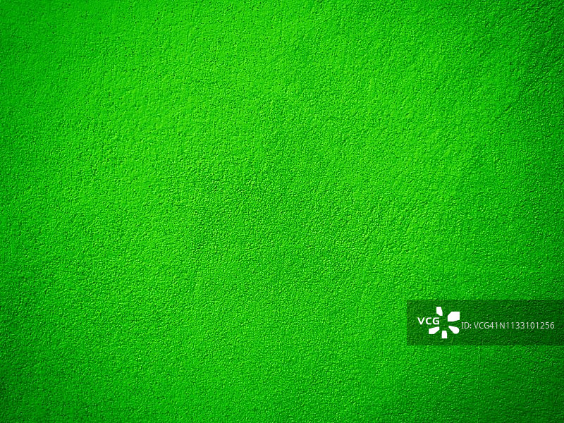 绿色水泥墙背景。图片素材