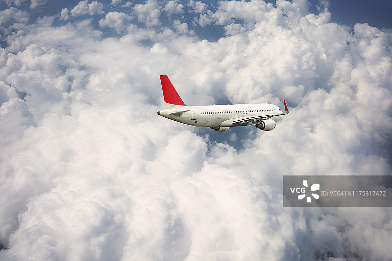 客机在云层上空飞行图片素材