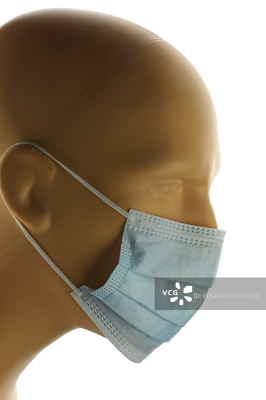 医用和医护人员防护口罩，防止佩戴者吸入空气传播的细菌或病毒颗粒图片素材