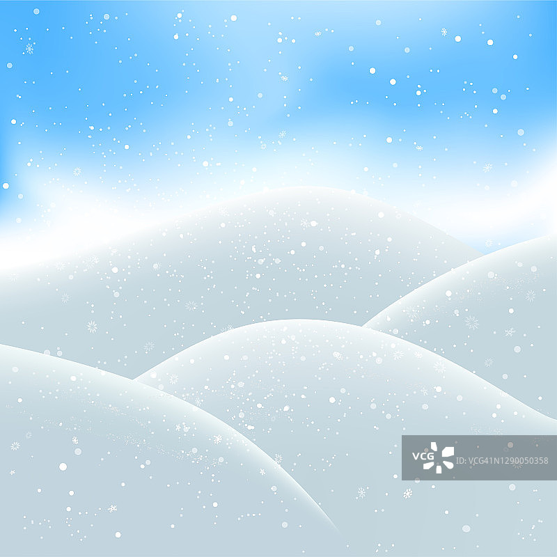 圣诞节的雪堆和雪花落在蓝天上图片素材