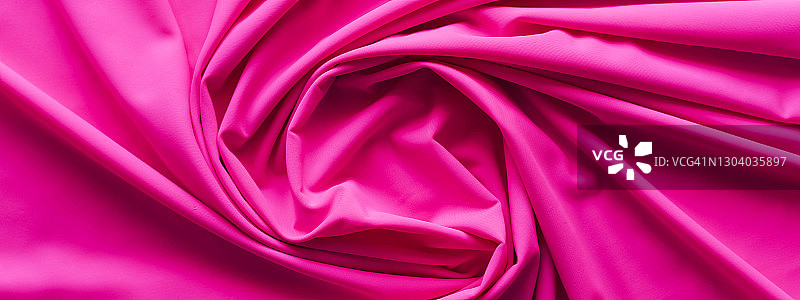 纹理织物粉红色的背景。图片素材