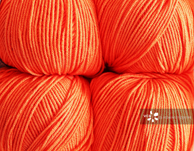 桃色编织用的四球纱线图片素材