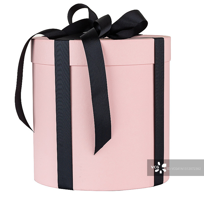 粉红色圆柱形礼盒与大黑色丝带蝴蝶结孤立在白色背景图片素材