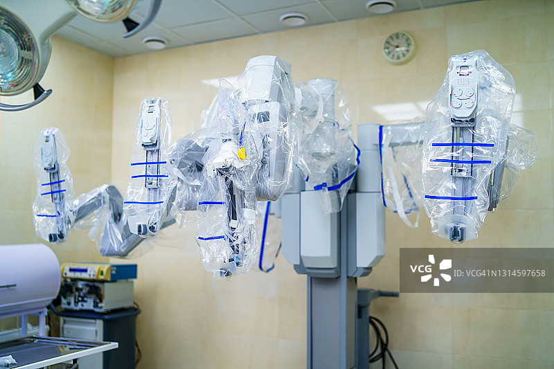 现代外科手术系统。医疗机器人。微创机器人手术。医学背景图片素材