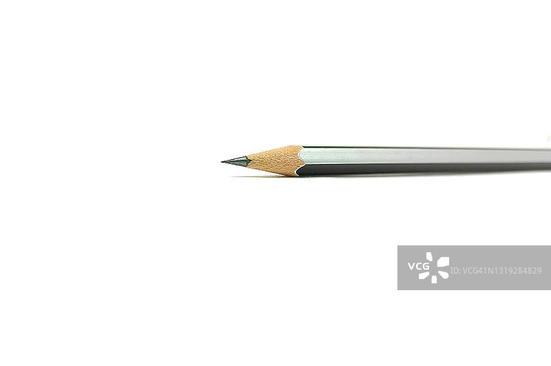 尖锐的铅笔在白色的背景，铅笔的特写图片素材