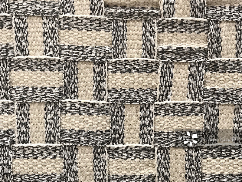 一个由天然材料制成的编织篮子的特写图片素材