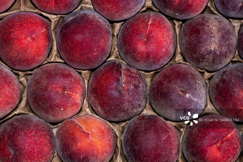 水果店出售的桃子水果的特写图片素材