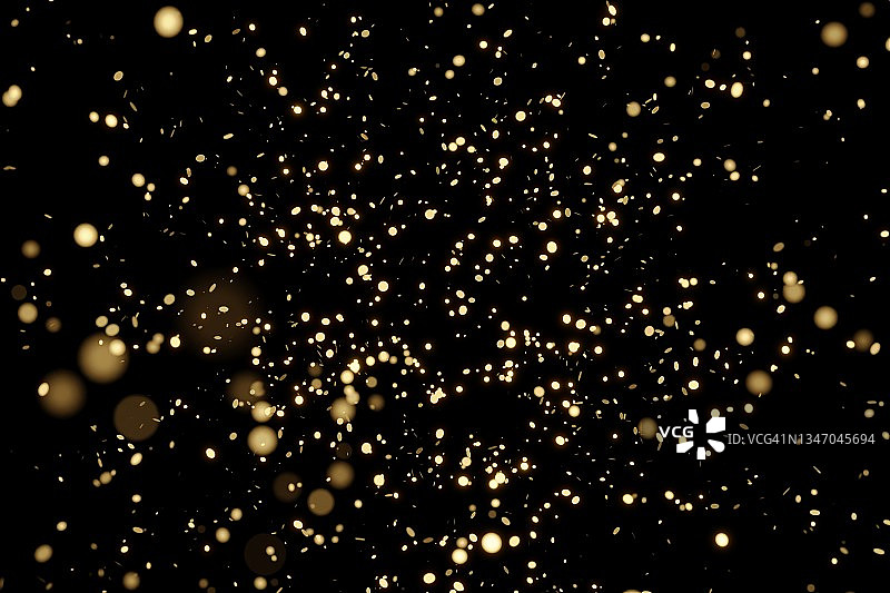 金光闪闪的五彩纸屑落在黑色孤立的背景上。圣诞和新年概念在时尚的节日金色。图片素材