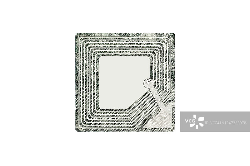 在白色背景上隔离的电子芯片。RFID标签用于跟踪和识别目的，并作为商业和零售中的防盗系统图片素材
