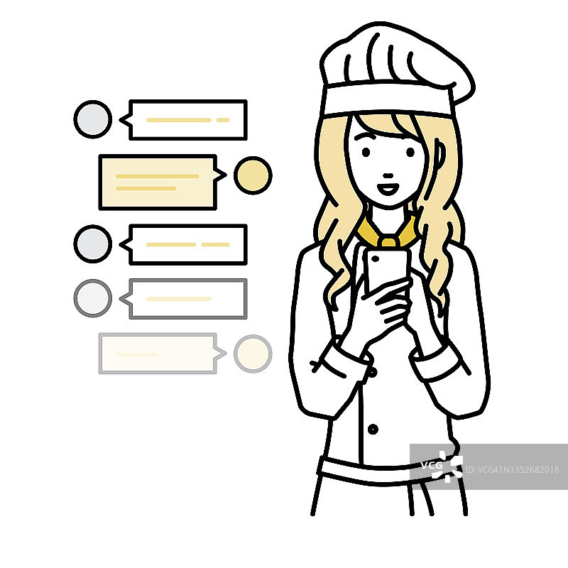 一位女厨师一边站着一边看着手里的智能手机，享受着社交网络聊天的乐趣图片素材