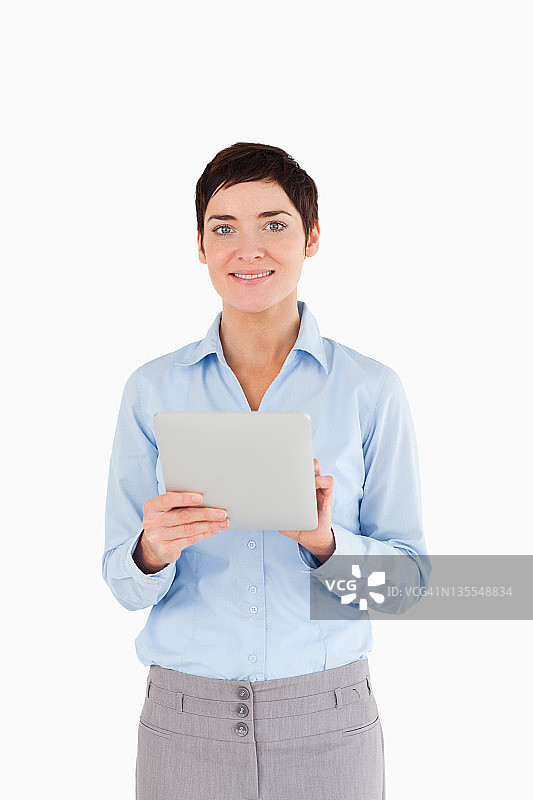 一个女商人拿着文件的肖像图片素材