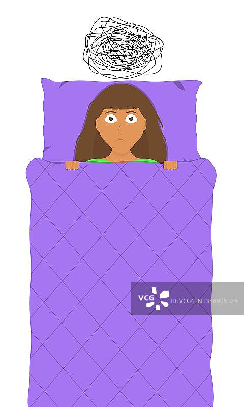 一个躺在床上的女人因为焦虑和焦虑的想法而失眠。图片素材