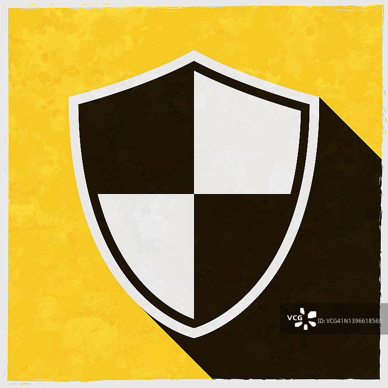 盾牌。图标与长阴影的纹理黄色背景图片素材