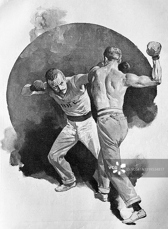 两个人在一场拳击比赛中图片素材
