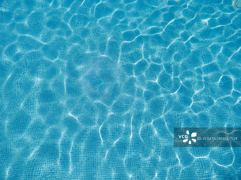 带波纹游泳池底焦散的抽象观点图片素材