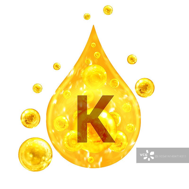 维生素k描绘了金色的水滴和带氧气泡泡的球。健康的概念。孤立在白色背景上图片素材