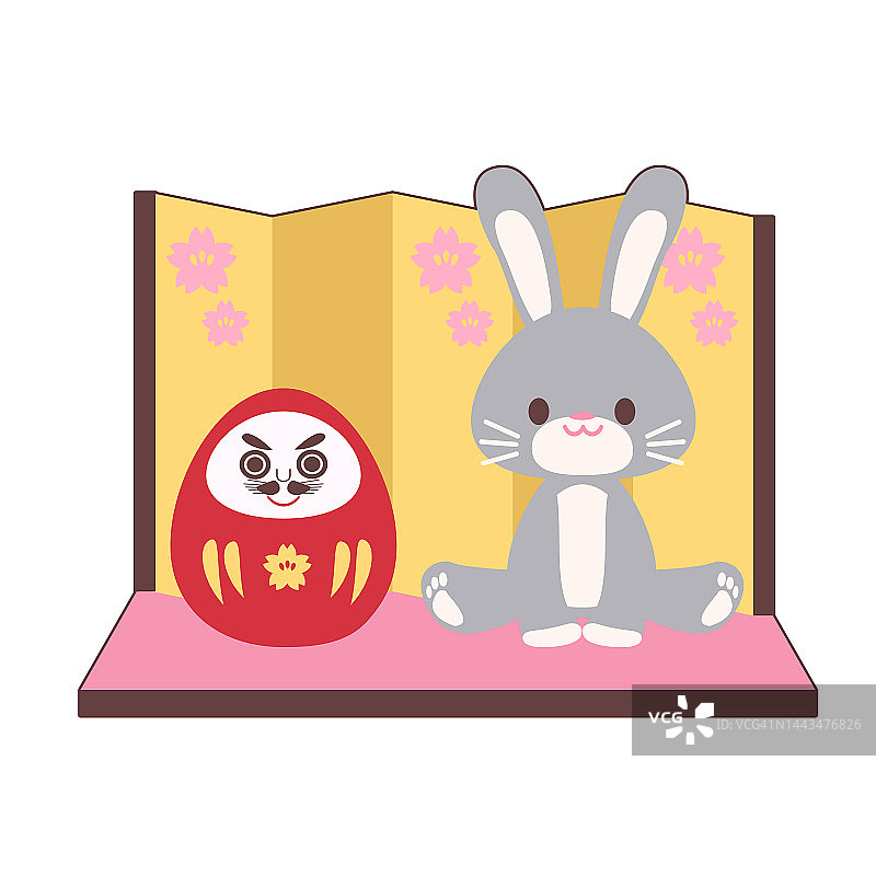 一只兔子和达摩坐在一个折叠屏风前图片素材