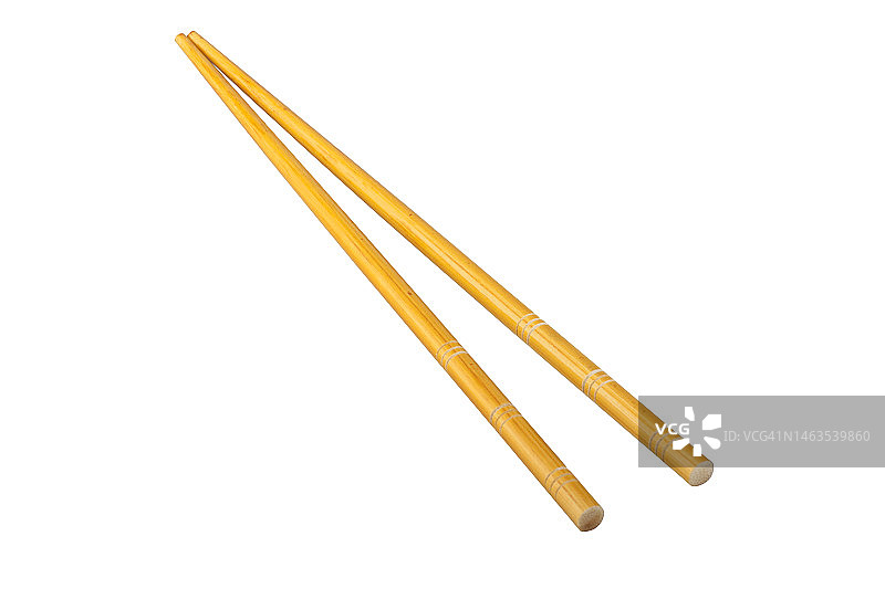 黄色木筷孤立在白色背景上图片素材