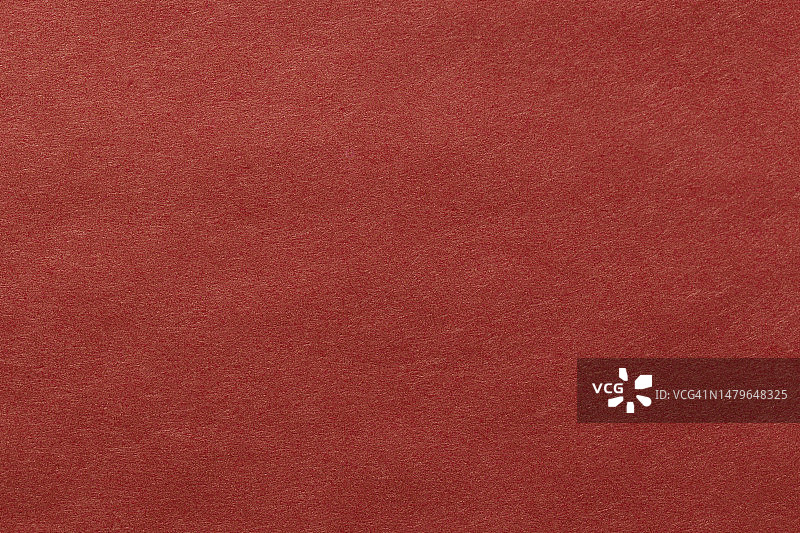 红色纸单纹理纸板背景。图片素材