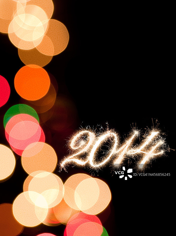 2014年新年的设计闪耀着散焦光图片素材