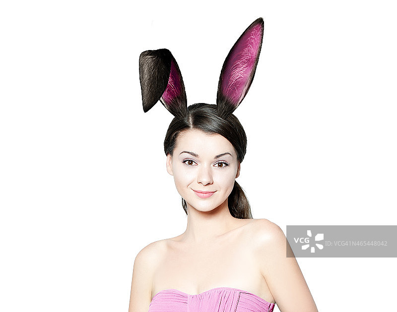 漂亮的年轻女人就像复活节兔子图片素材