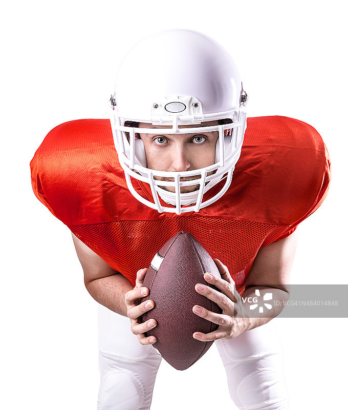 穿着红色制服的足球运动员，在白色背景上孤立图片素材